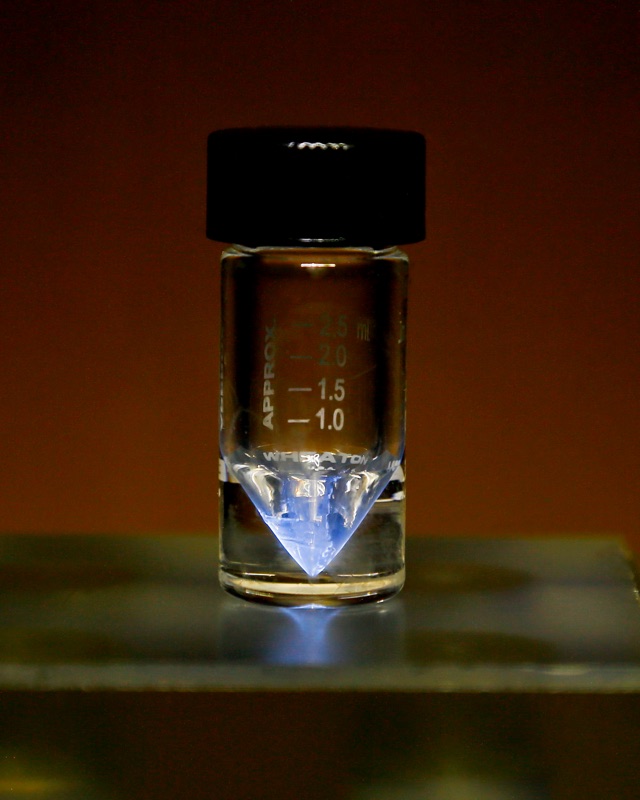 Actinium — Actinium-225 medical radioisotope held in a v-vial at ORNL. The blue glow comes from the ionization of surrounding air by alpha particles